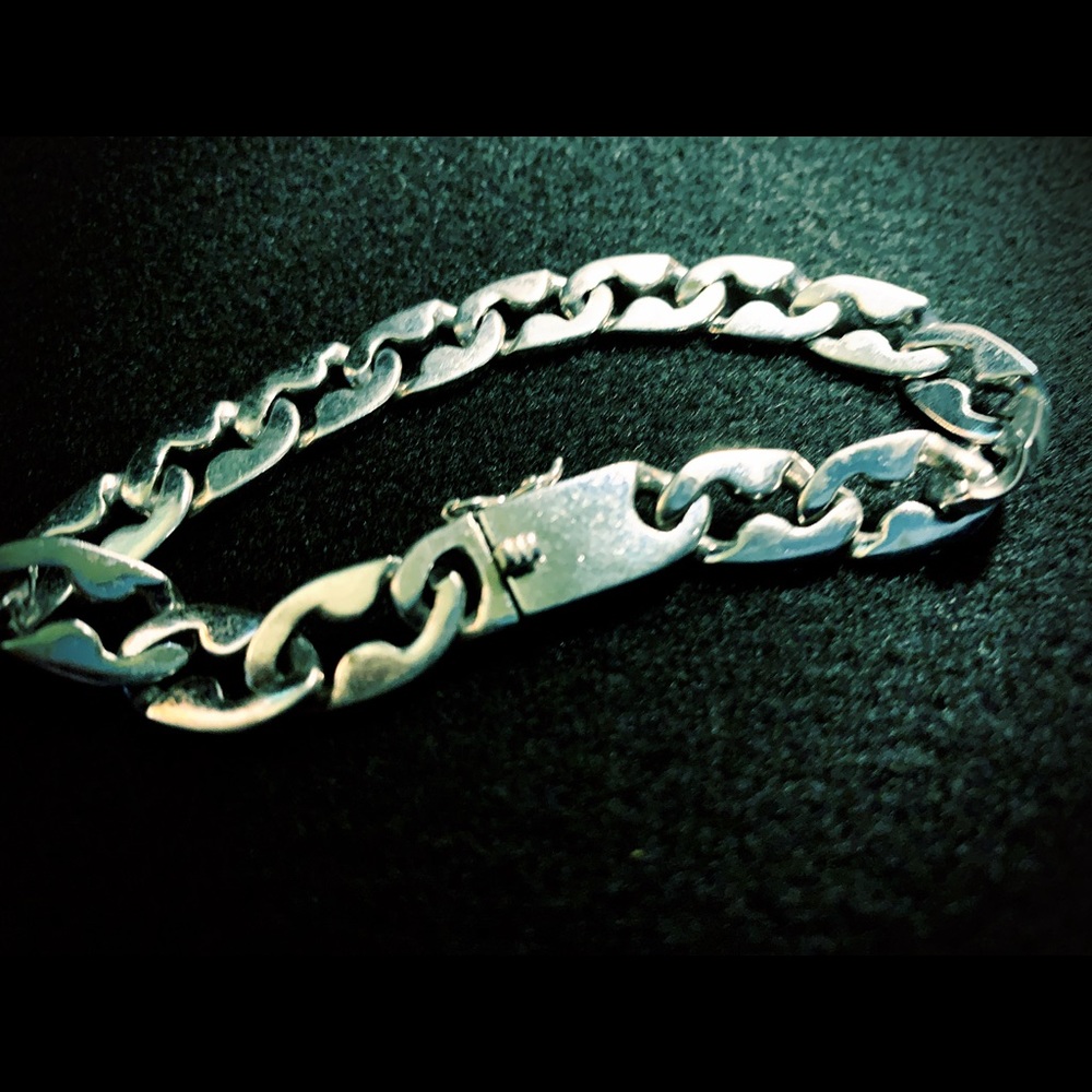 Men’s Sterling Silver flat link bracelet.